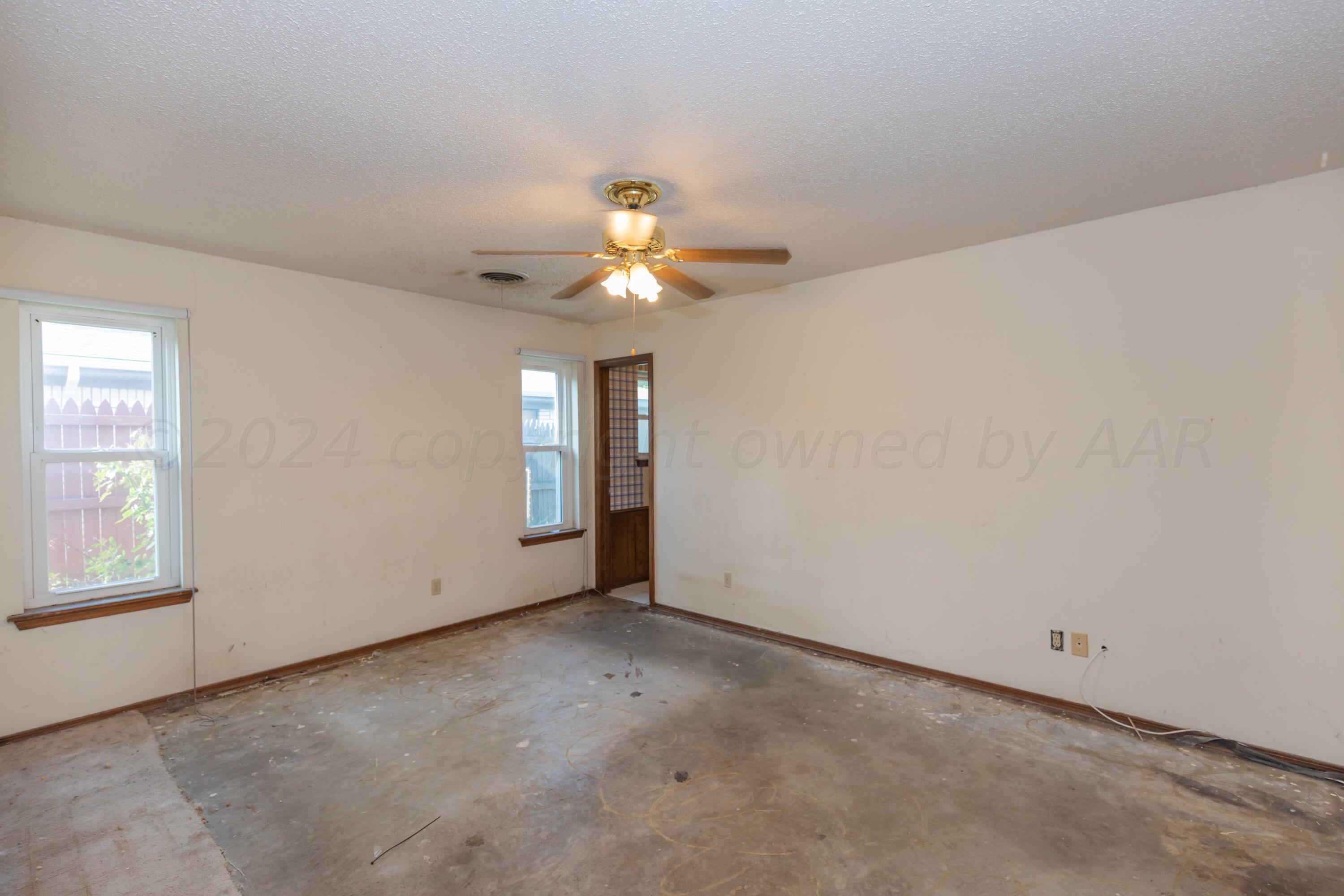 5304 Leigh Avenue Amarillo, TX 79110 - Photo 30 of 36 a view of an empty room with a window
