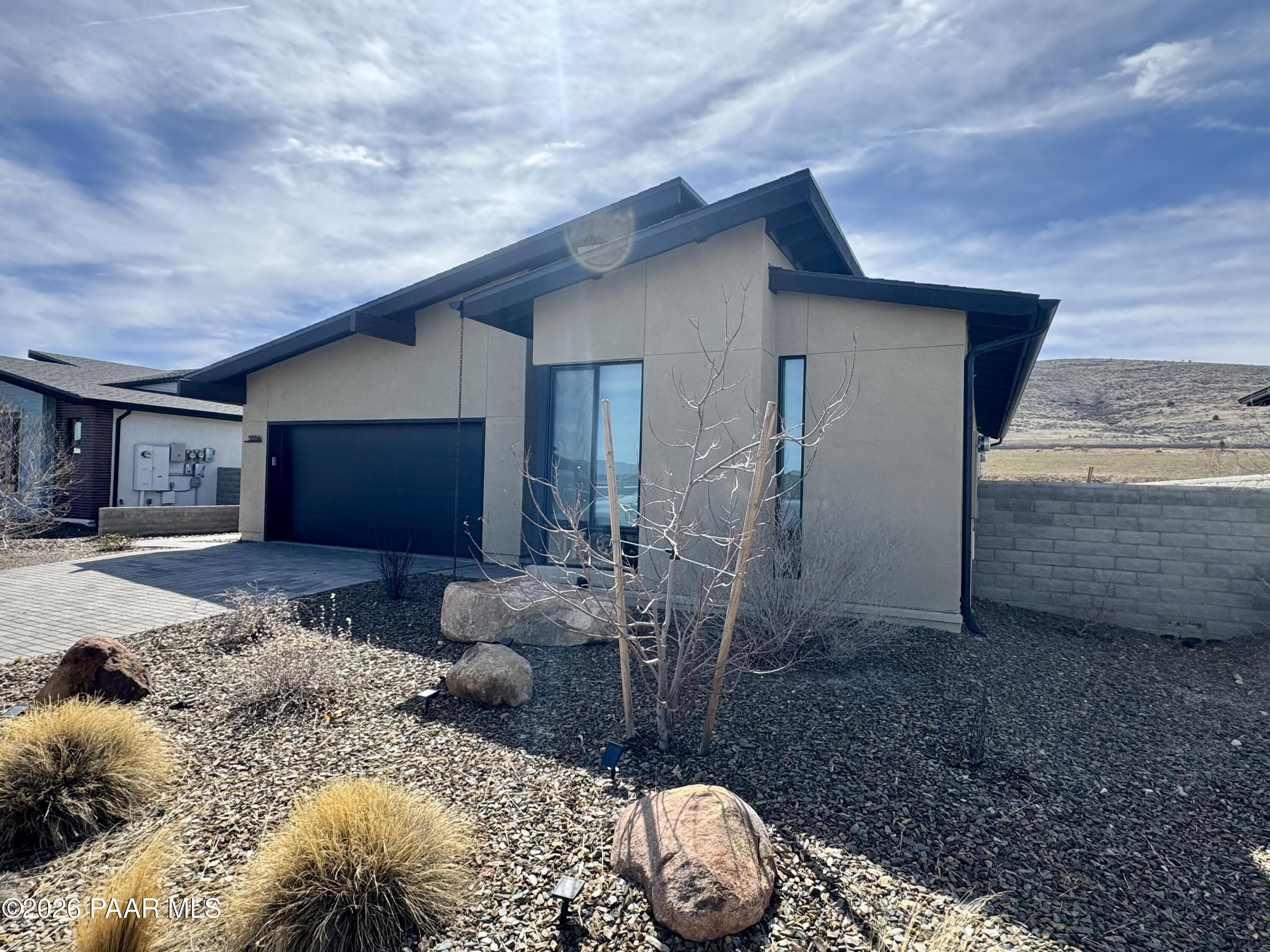 5556 East Killen Loop Prescott Valley, AZ 86314 - Photo 3 of 27 a house with outdoor space