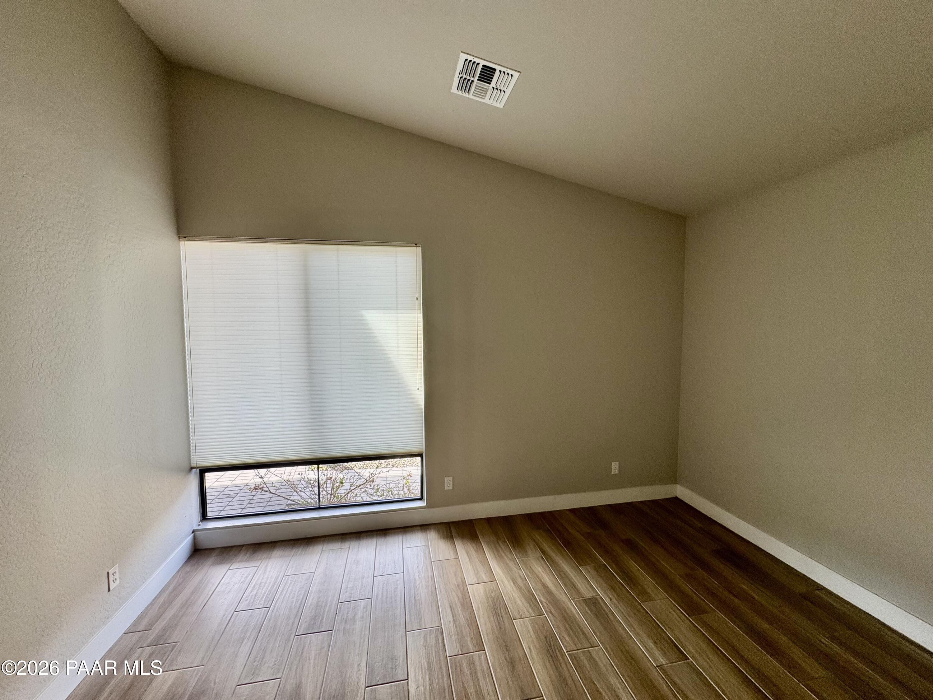 5556 East Killen Loop Prescott Valley, AZ 86314 - Photo 8 of 27 a view of a room with wooden floor