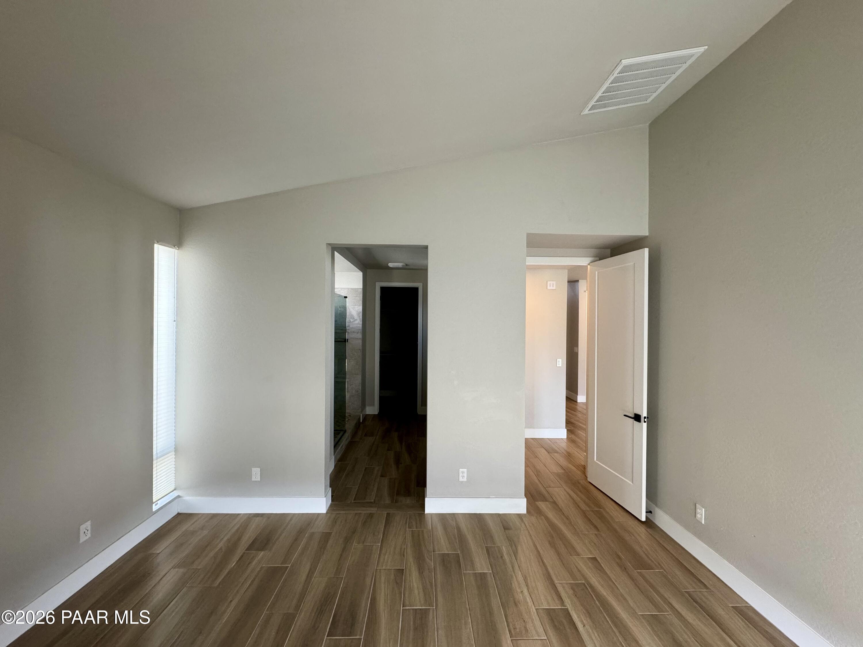 5556 East Killen Loop Prescott Valley, AZ 86314 - Photo 9 of 27 wooden floor in an empty room