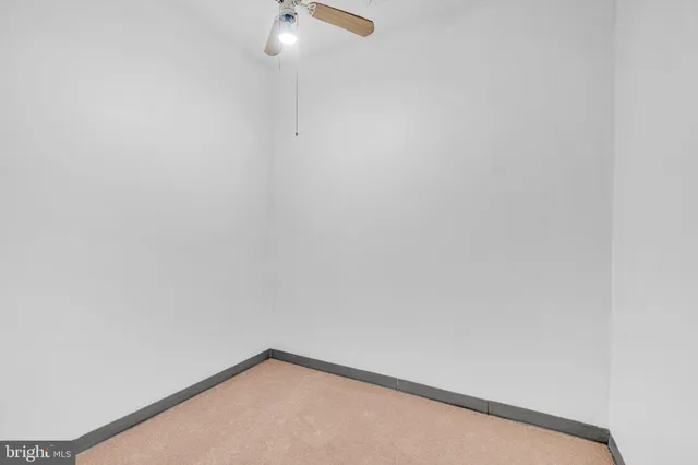 a view of a small space with wooden floor