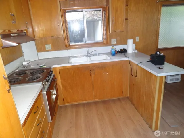 a bathroom with a sink a mirror and a bathtub