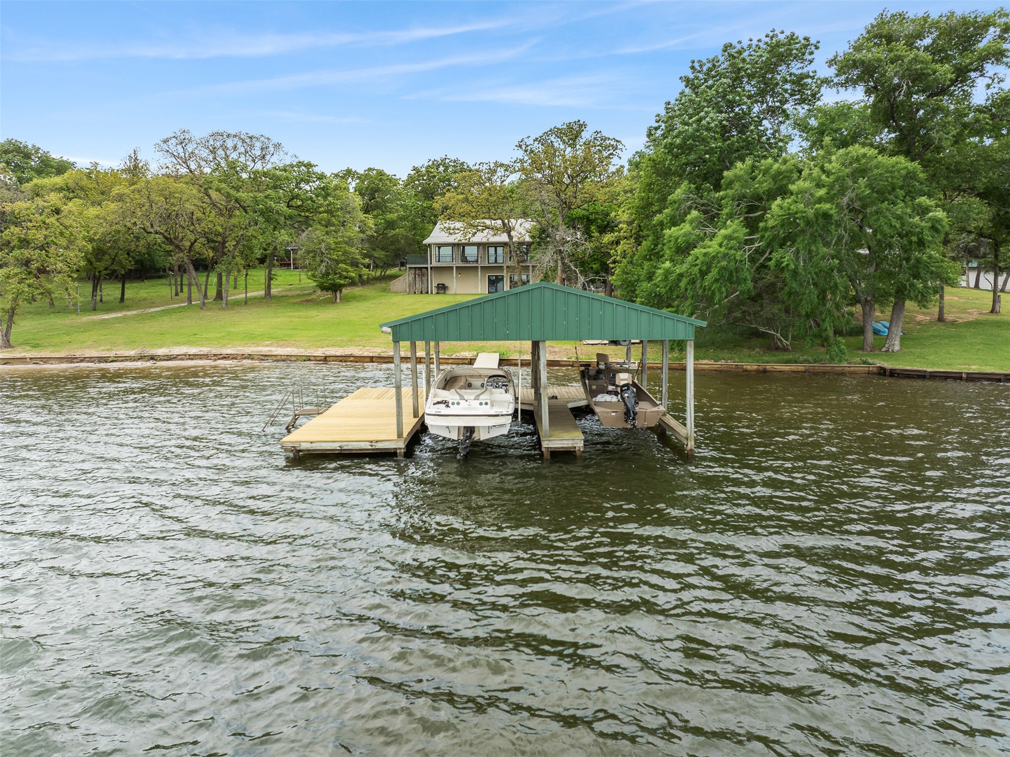 10959 Clyde Acord Road Franklin, TX 77856 - Photo 39 of 39 a view of a lake with a yard