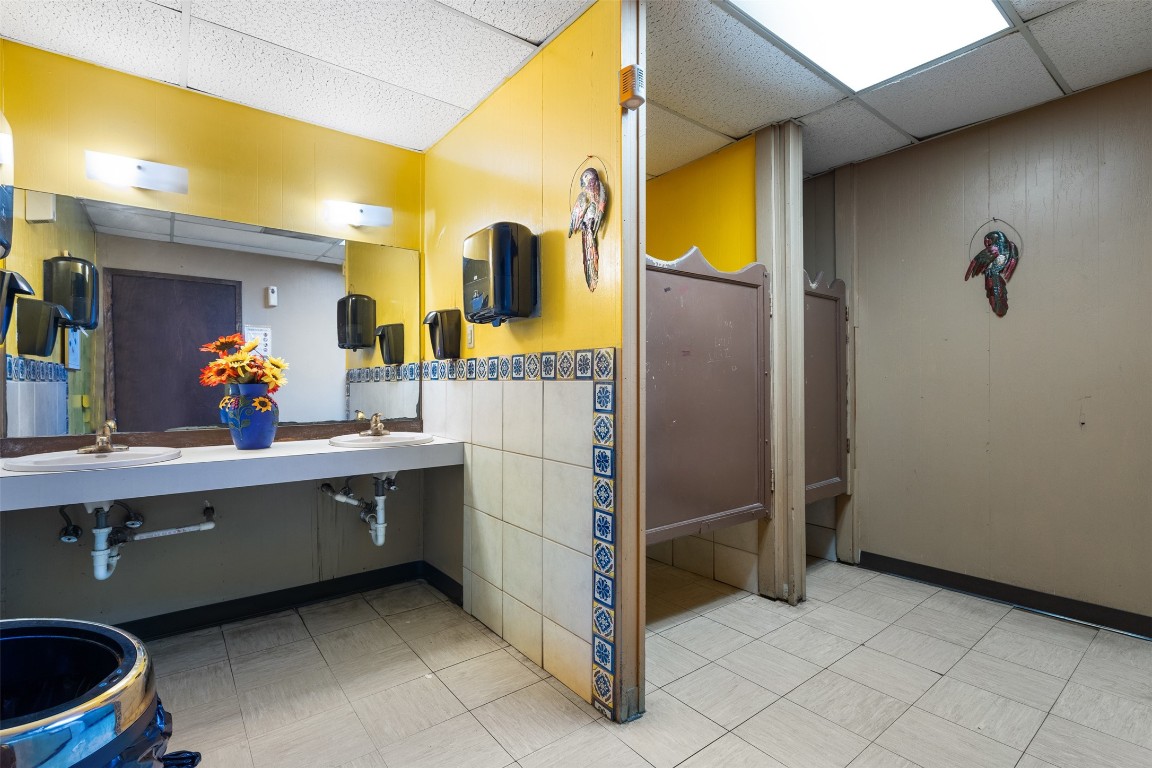 13436 State Highway 71 Bee Cave, TX 78738 - Photo 18 of 35 a room with sink and mirror