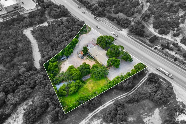 a view of a garden with wooden stairs