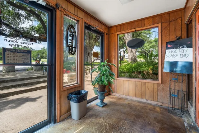 a view of a porch with seating space