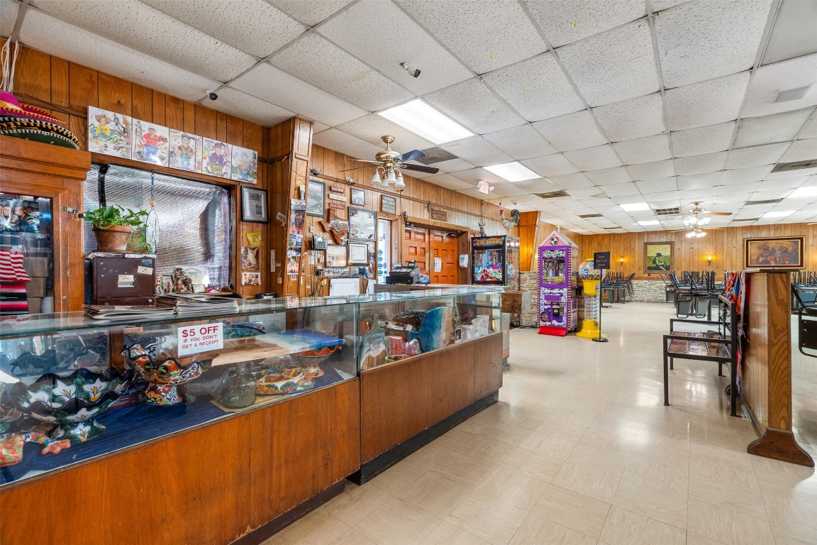 13436 State Highway 71 Bee Cave, TX 78738 - Photo 8 of 35 a living room with lots of furniture and white walls