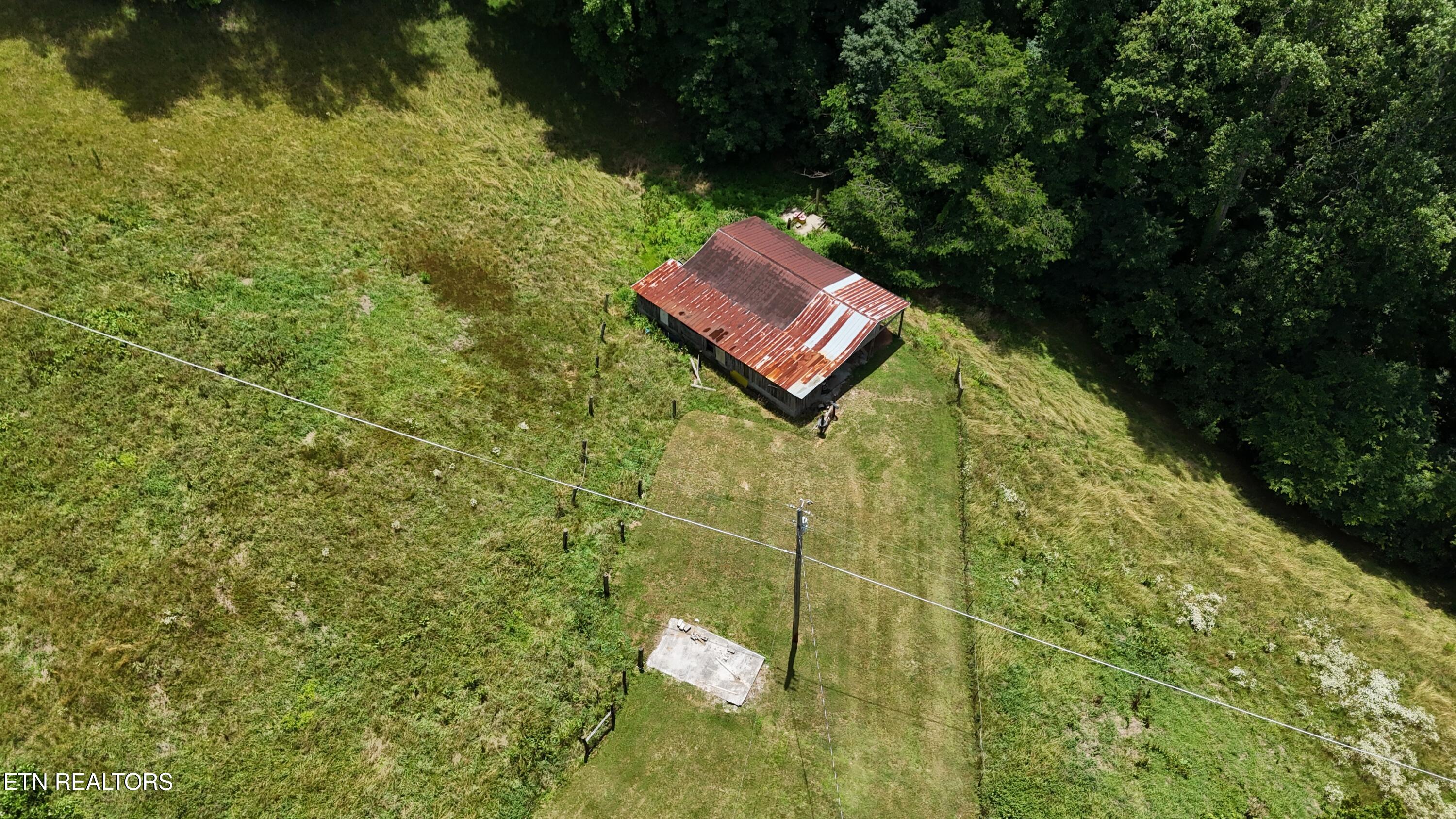 105 Echo Valley Road Rocky Top, TN 37769 - Photo 6 of 55 dji_fly_20260619_133834_0078_17818903995