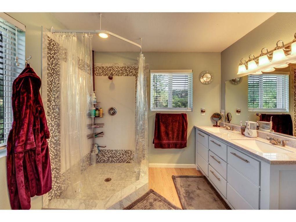 2235 Skunk Ranch Road Murphys, CA 95247 - Photo 11 of 22 a bathroom with a tub sink and mirror