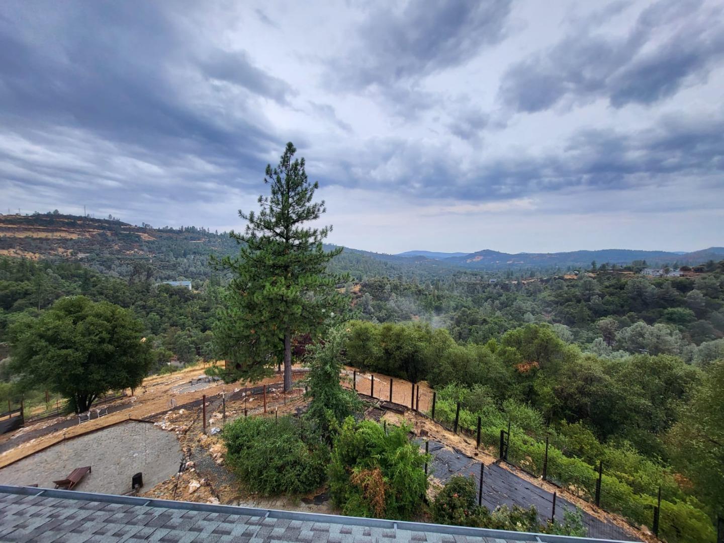 2235 Skunk Ranch Road Murphys, CA 95247 - Photo 2 of 22 a view of a city from a balcony