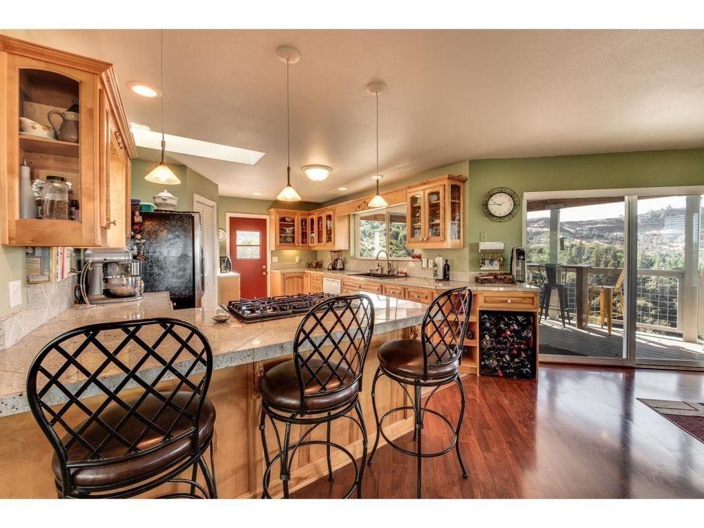 2235 Skunk Ranch Road Murphys, CA 95247 - Photo 6 of 22 a dinning area with furniture and wooden floor
