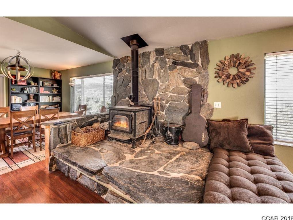 2235 Skunk Ranch Road Murphys, CA 95247 - Photo 7 of 22 a living room with furniture and a couch