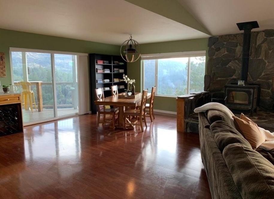 2235 Skunk Ranch Road Murphys, CA 95247 - Photo 8 of 22 a dining room with furniture window and wooden floor
