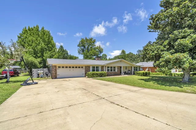 a view of house with outdoor space and street view