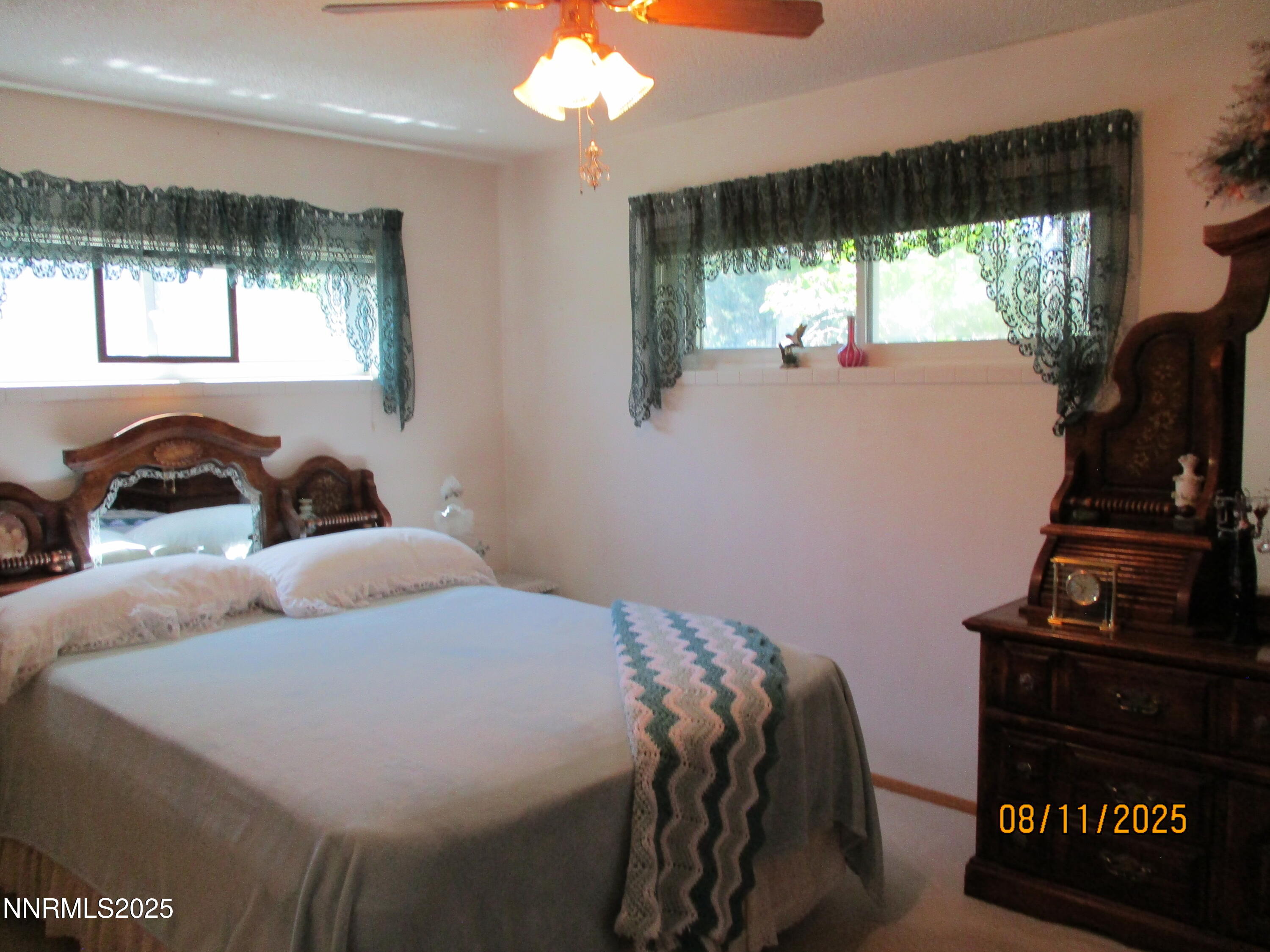 210 Modoc Drive Winnemucca, NV 89445 - Photo 17 of 25 a bedroom with a bed and window