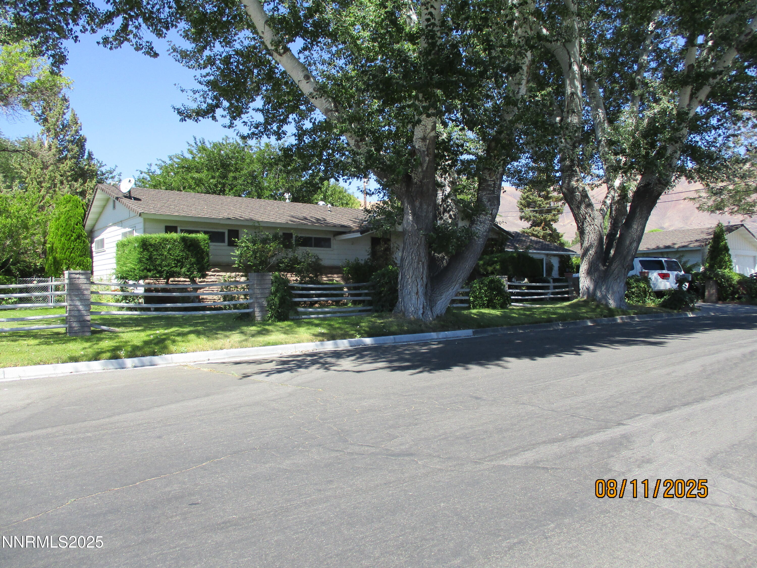 210 Modoc Drive Winnemucca, NV 89445 - Photo 4 of 25 a view of street with a cars parked