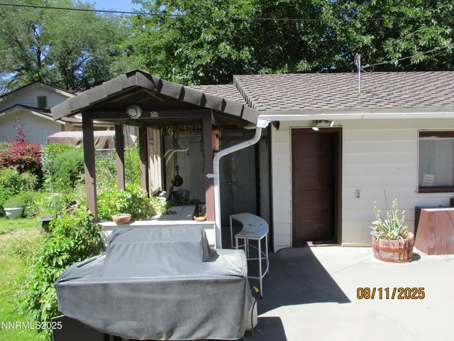 a view of a patio in front of house