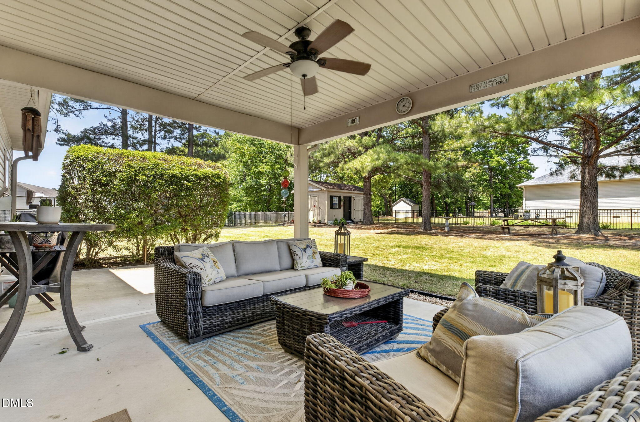 20 Deep Clay Circle Angier, NC 27501 - Photo 41 of 54 a living room with patio furniture and a large pool