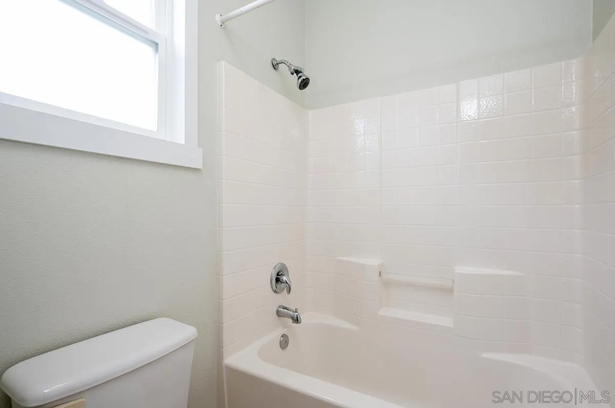 1818 Sheep Ranch Loop Chula Vista, CA 91913 - Photo 25 of 40 a bathroom with a bathtub and a toilet