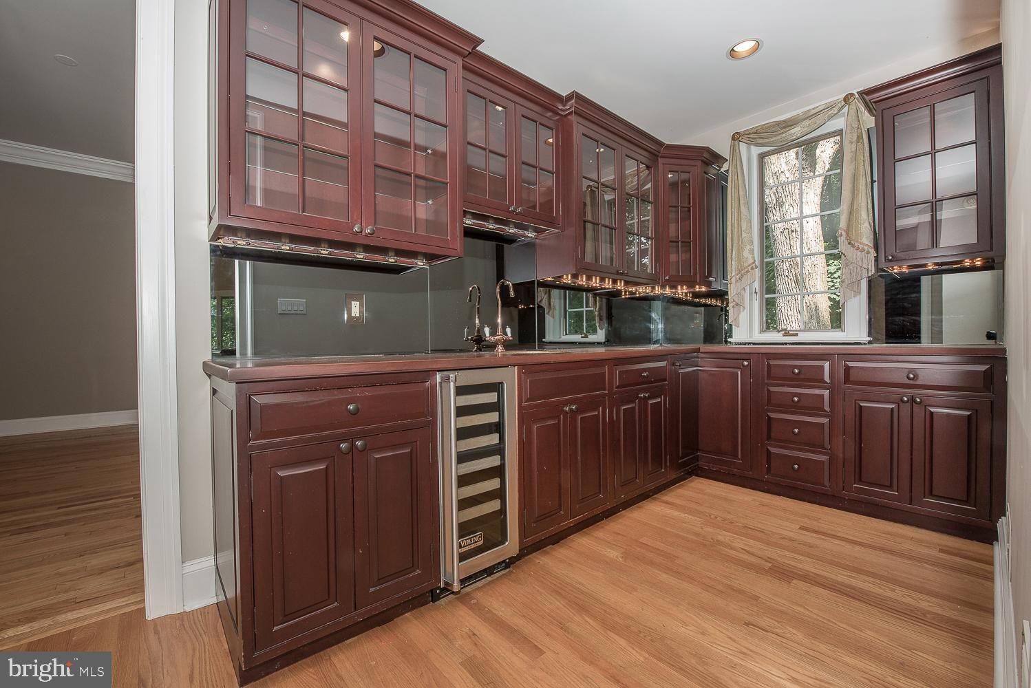 1224 Valley Road Villanova, PA 19085 - Photo 19 of 37 Butler Pantry with wine cooler& mahogany cabinets