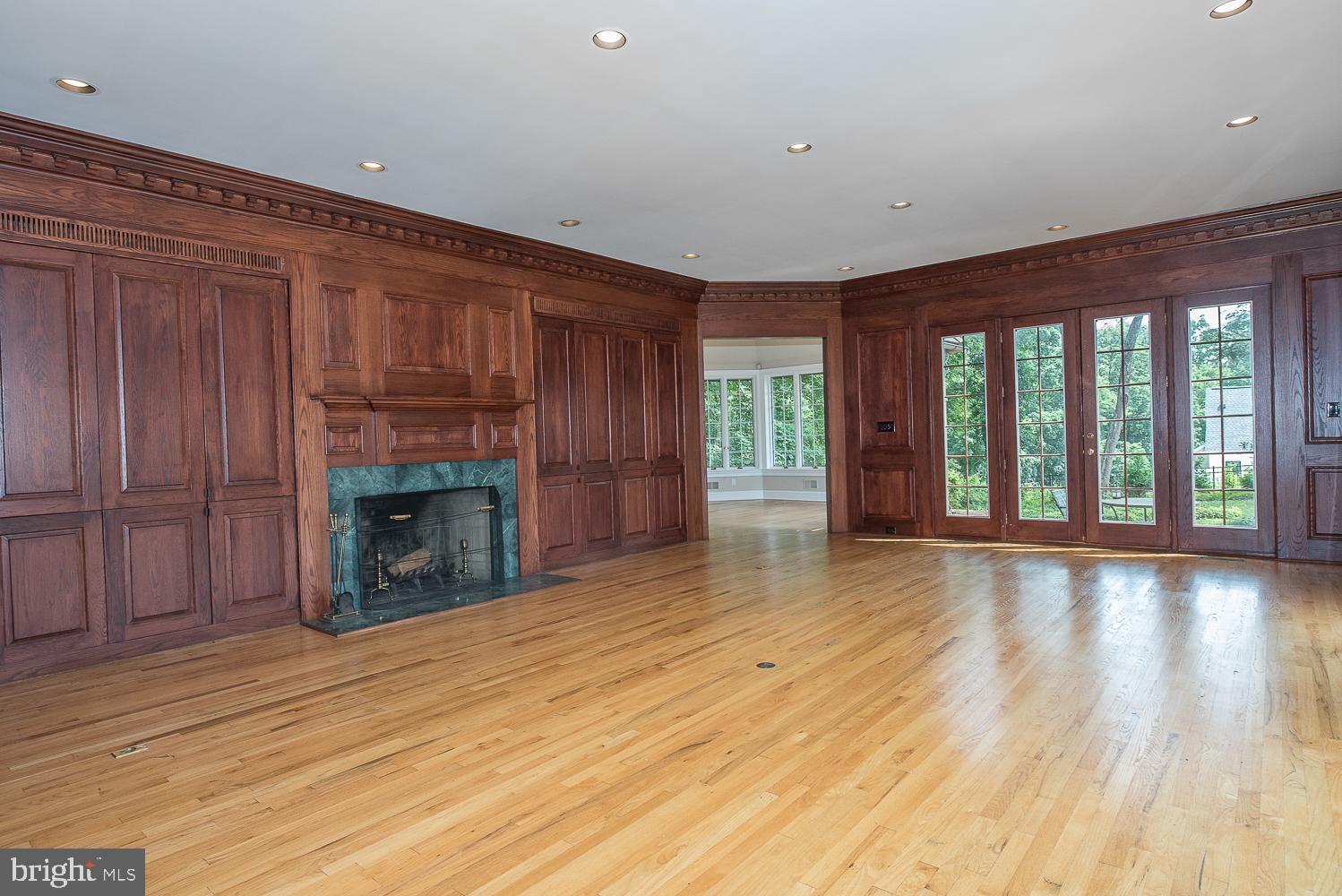 1224 Valley Road Villanova, PA 19085 - Photo 20 of 37 Family Room with mahogany walls & marble fireplace