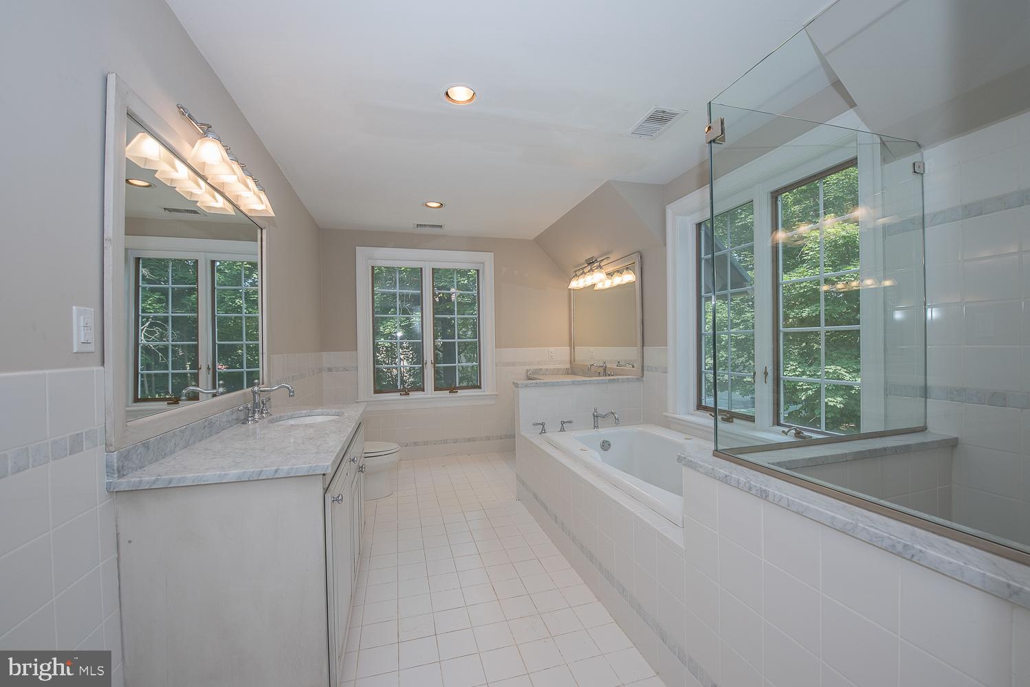 1224 Valley Road Villanova, PA 19085 - Photo 32 of 37 Renovated marble baths with tub and shower
