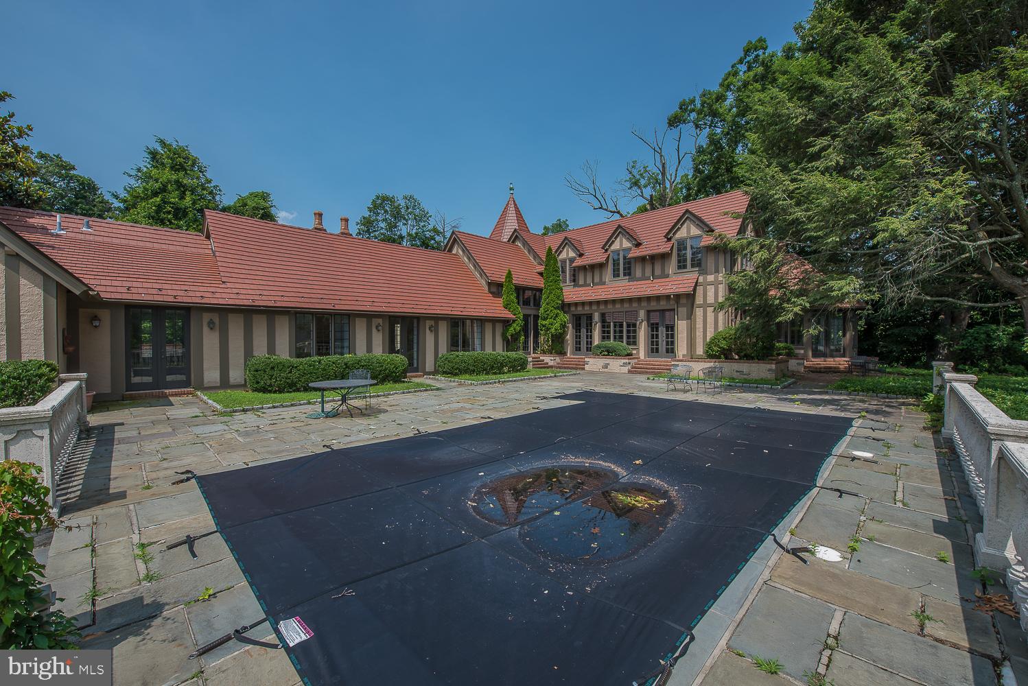 1224 Valley Road Villanova, PA 19085 - Photo 36 of 37 In ground pool with slate patio