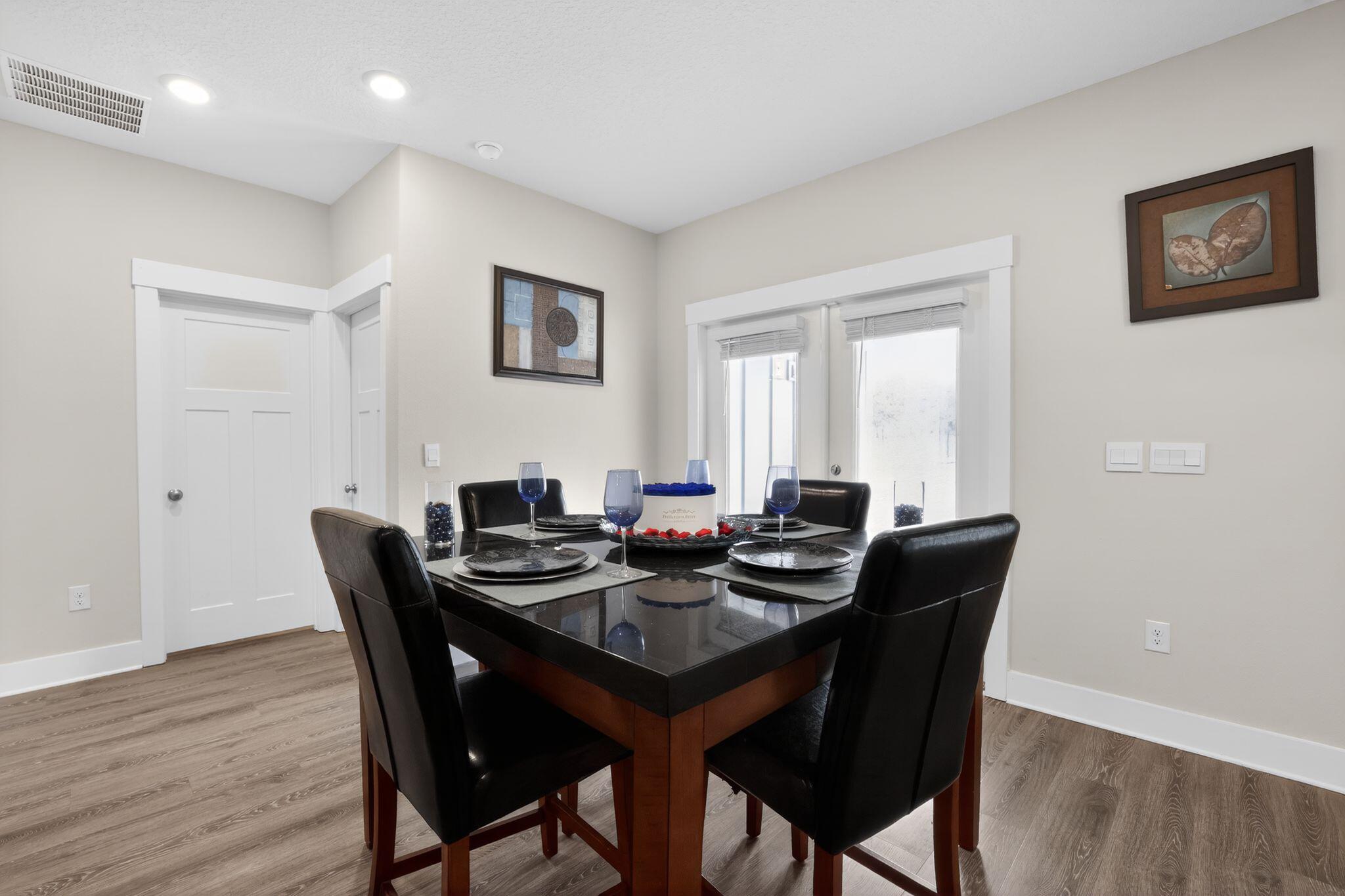 2452 Dakota Way Crestview, FL 32536 - Photo 14 of 24 a dining room with furniture and wooden floor