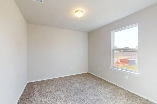 an empty room with a window