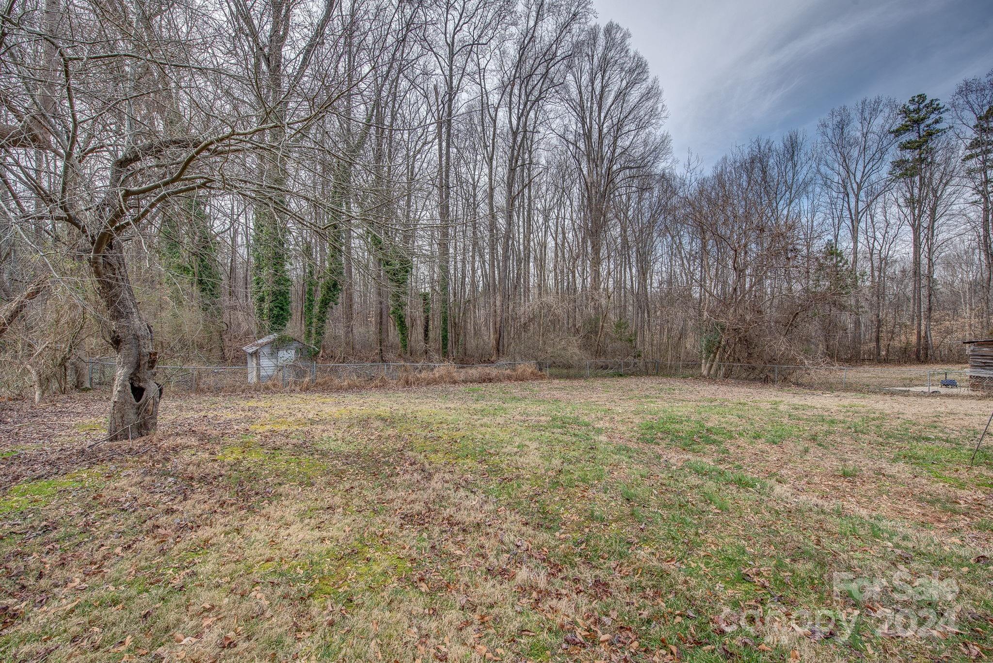2714 Rufus Ratchford Road Gastonia, NC 28056 - Photo 21 of 28 a view of outdoor space with trees