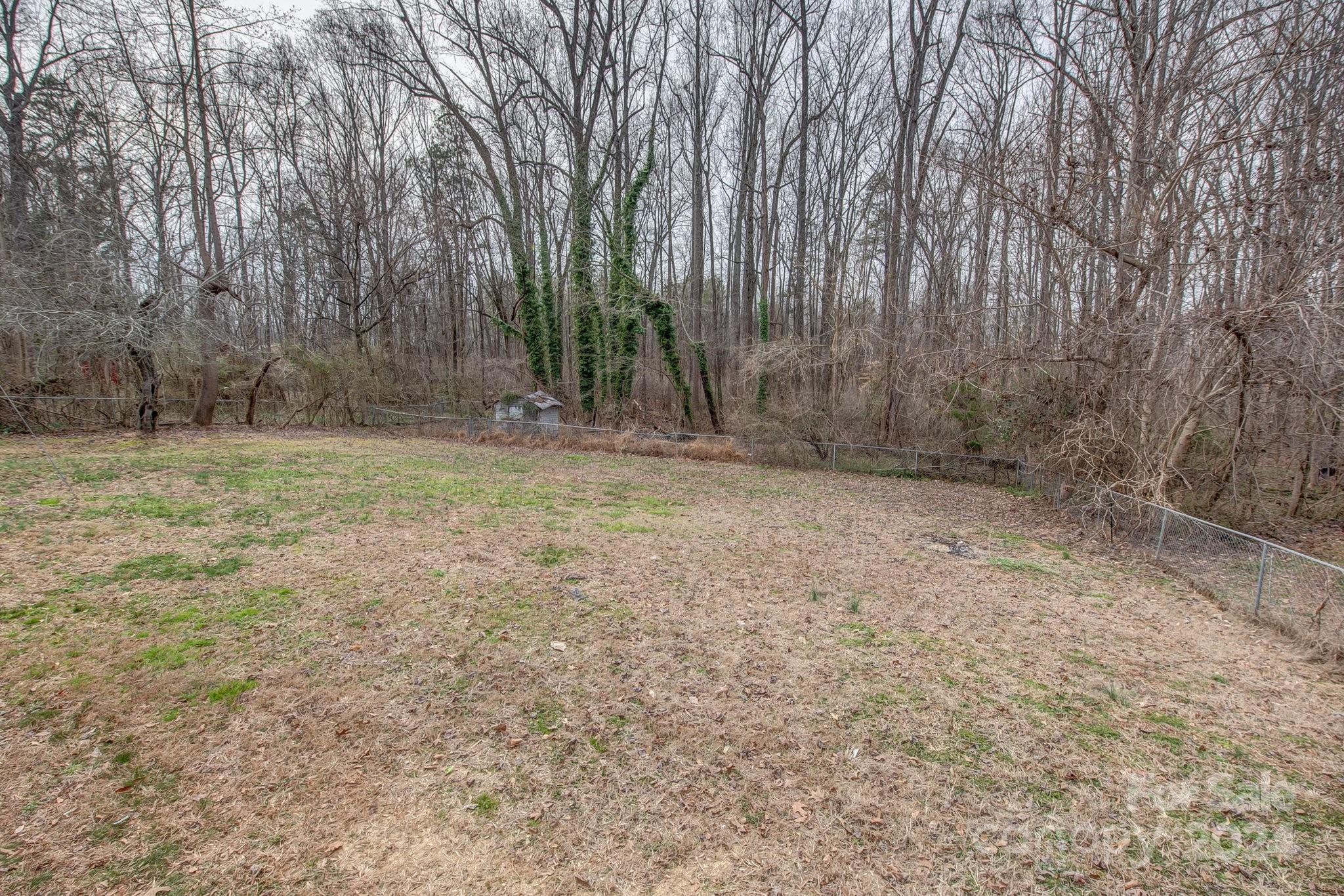 2714 Rufus Ratchford Road Gastonia, NC 28056 - Photo 27 of 28 a view of a yard with trees