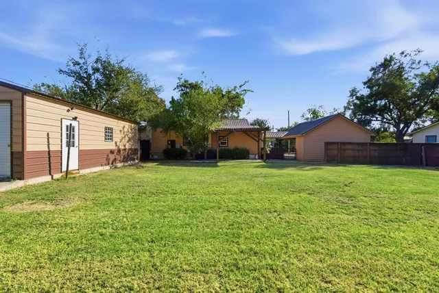 a house view with a garden space