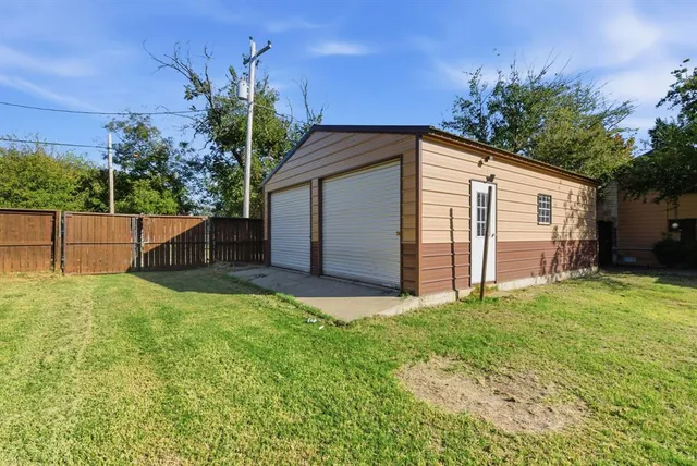 a house view with a garden space