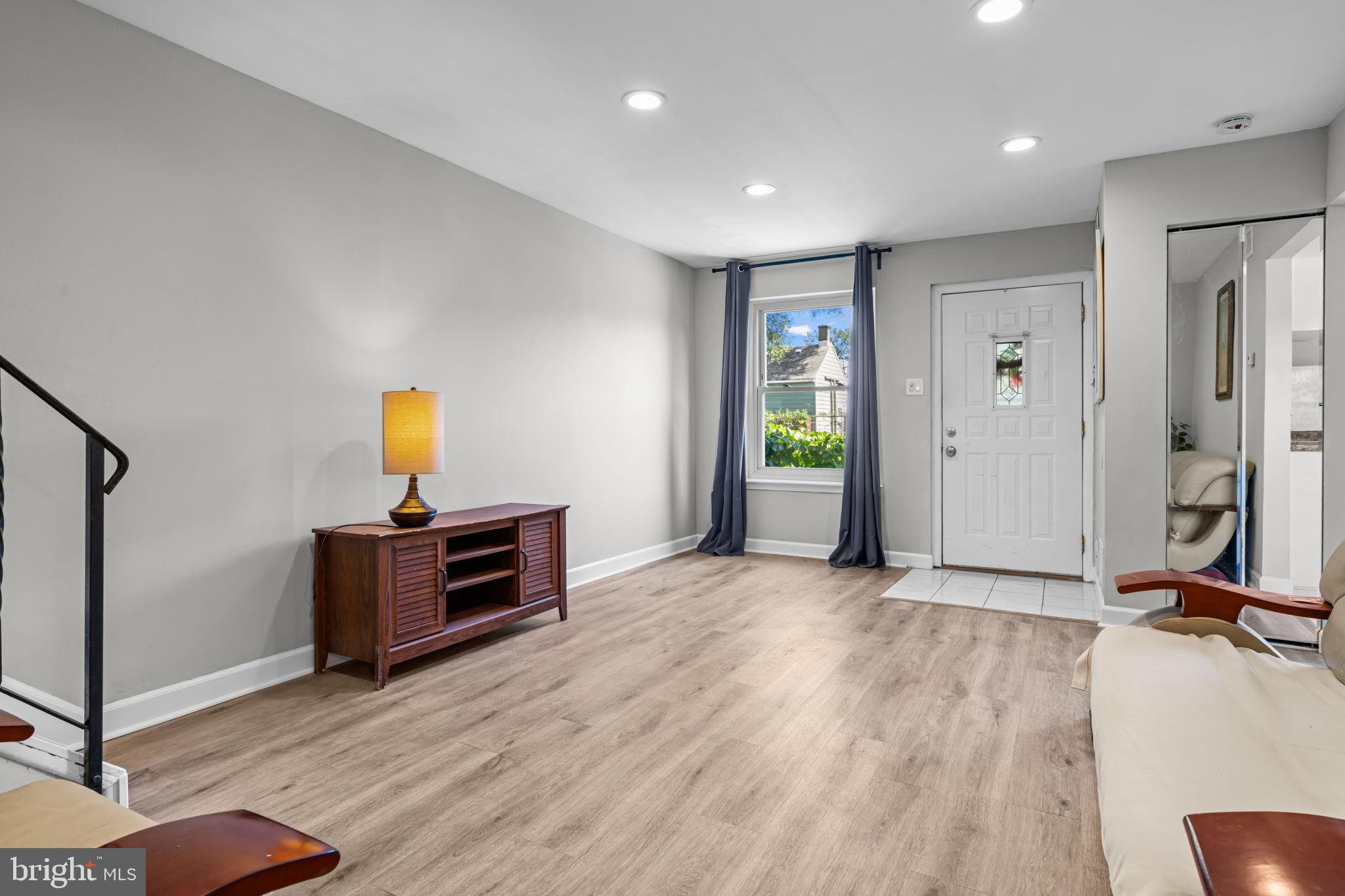 Bright and inviting entryway with natural light.