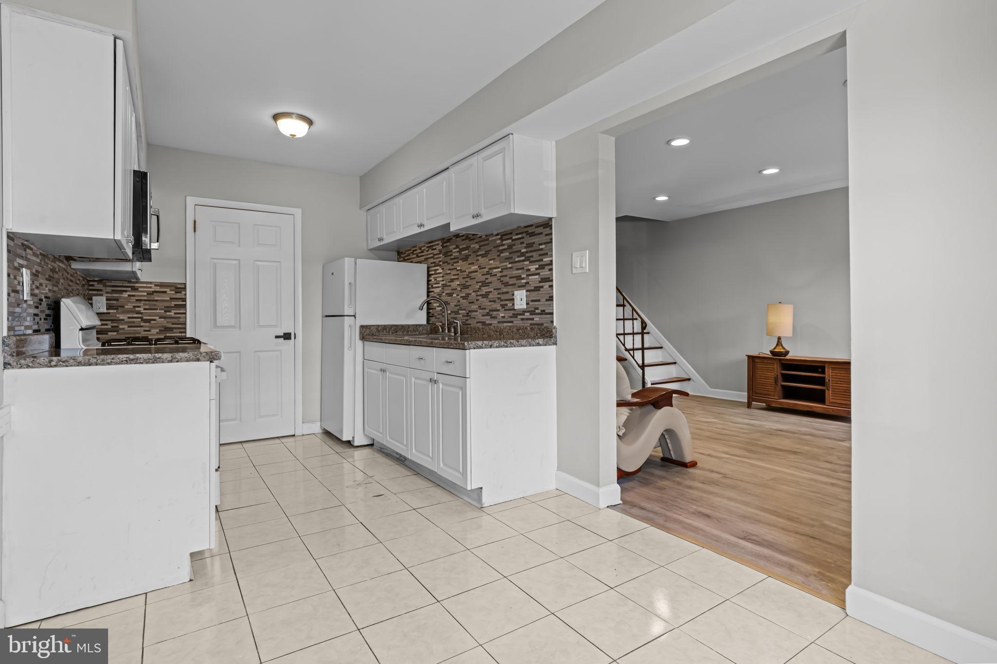 Modern kitchen with open living space.