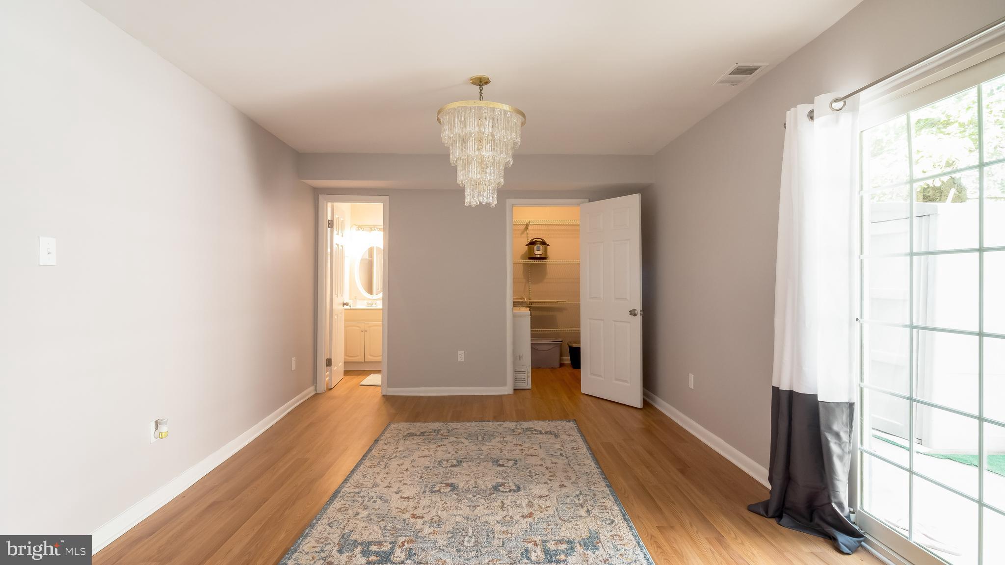 2916 Hewitt Avenue, Unit 1 Silver Spring, MD 20906 - Photo 14 of 27 Dining Table area w/ Chandelier