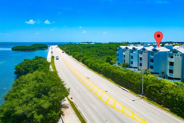 a view of a city street from a balcony