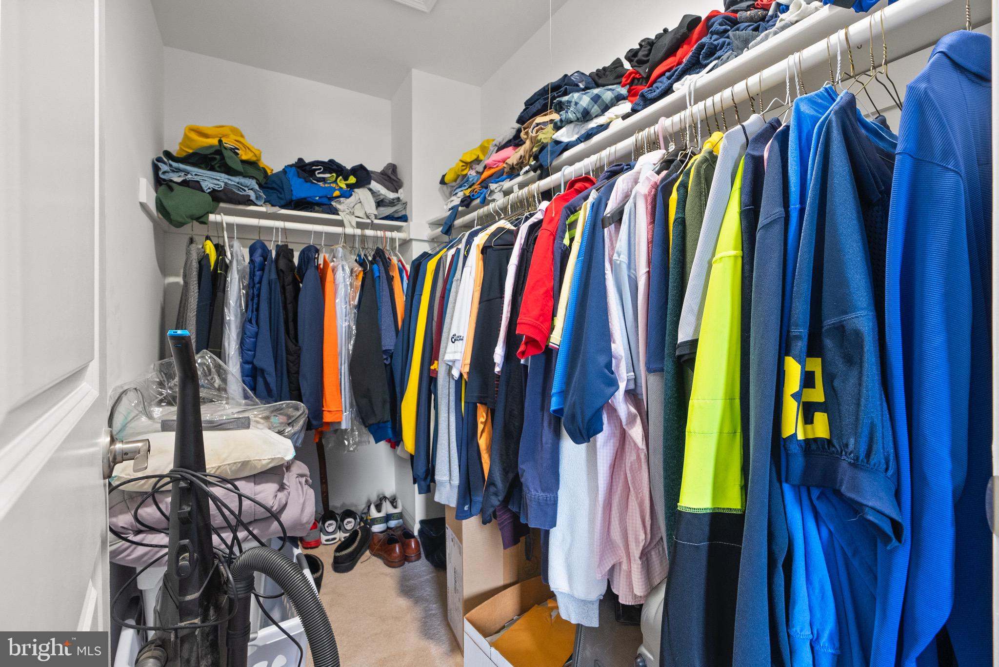 2297 Memorial Court Atco, NJ 08004 - Photo 14 of 21 a view of walk in closet with clothes