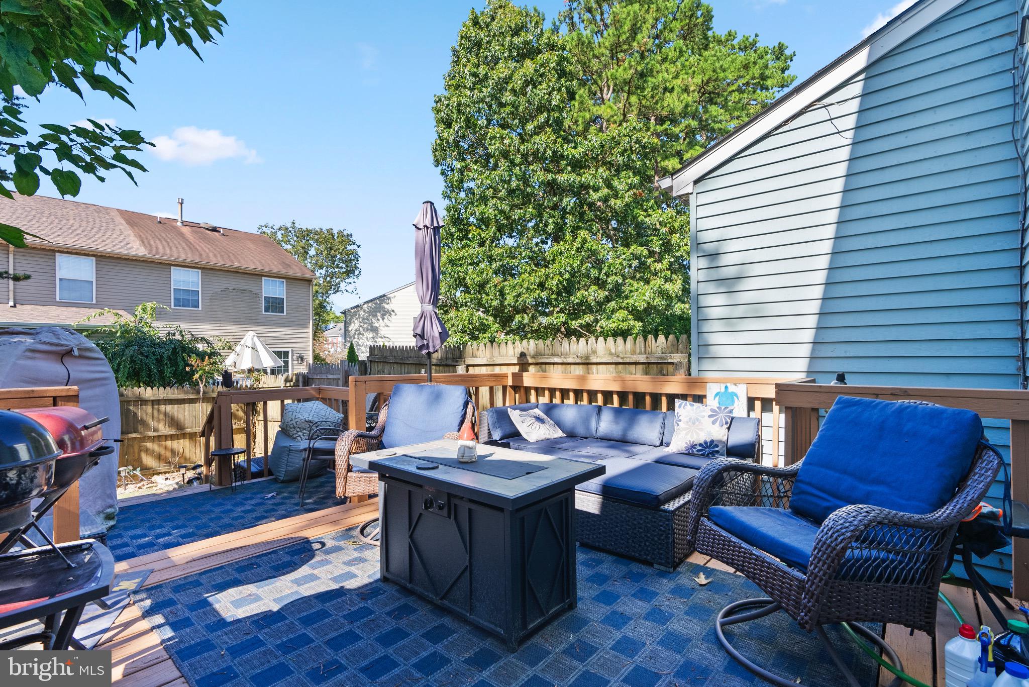 2297 Memorial Court Atco, NJ 08004 - Photo 16 of 21 a view of a chairs and table in the back yard of the house