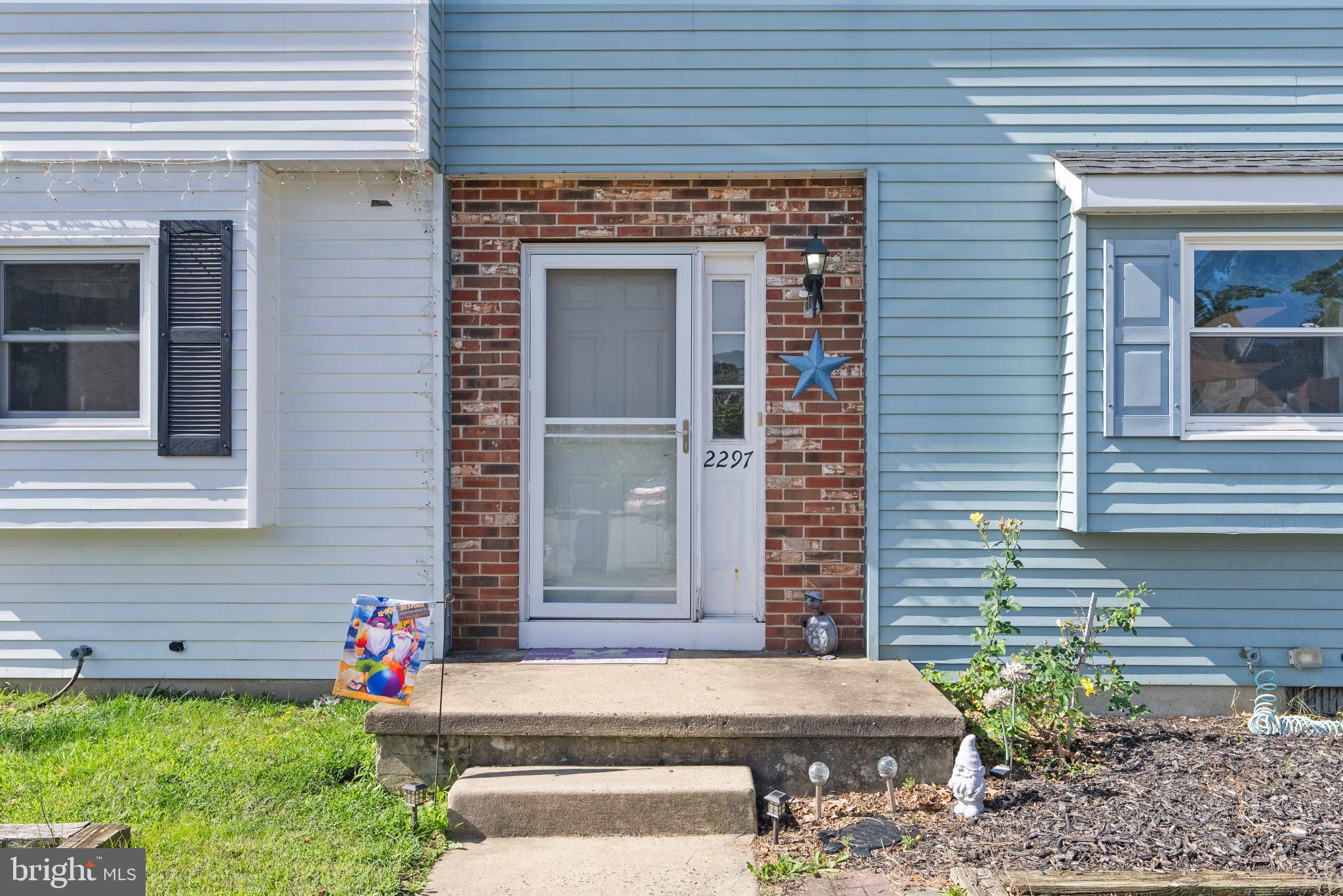 2297 Memorial Court Atco, NJ 08004 - Photo 20 of 21 a front view of a house with garden