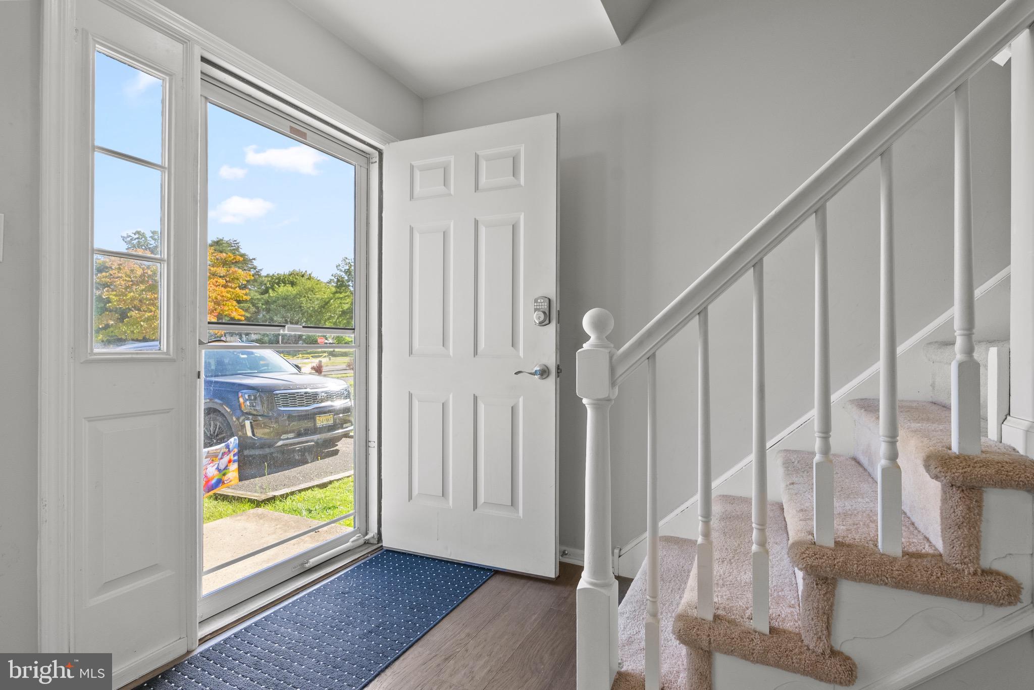 2297 Memorial Court Atco, NJ 08004 - Photo 2 of 21 a view of an entryway with wooden floor and door