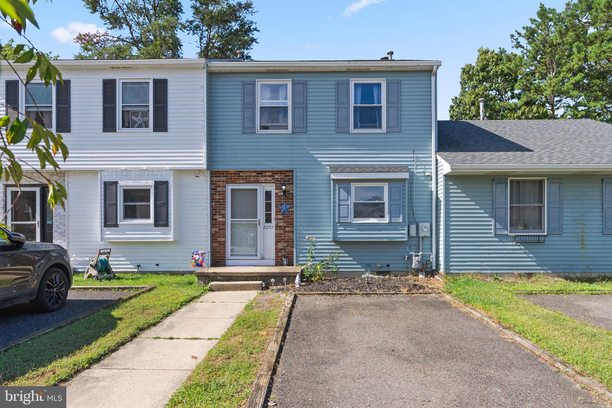 2297 Memorial Court Atco, NJ 08004 - Photo 21 of 21 a front view of a house with a yard and garage