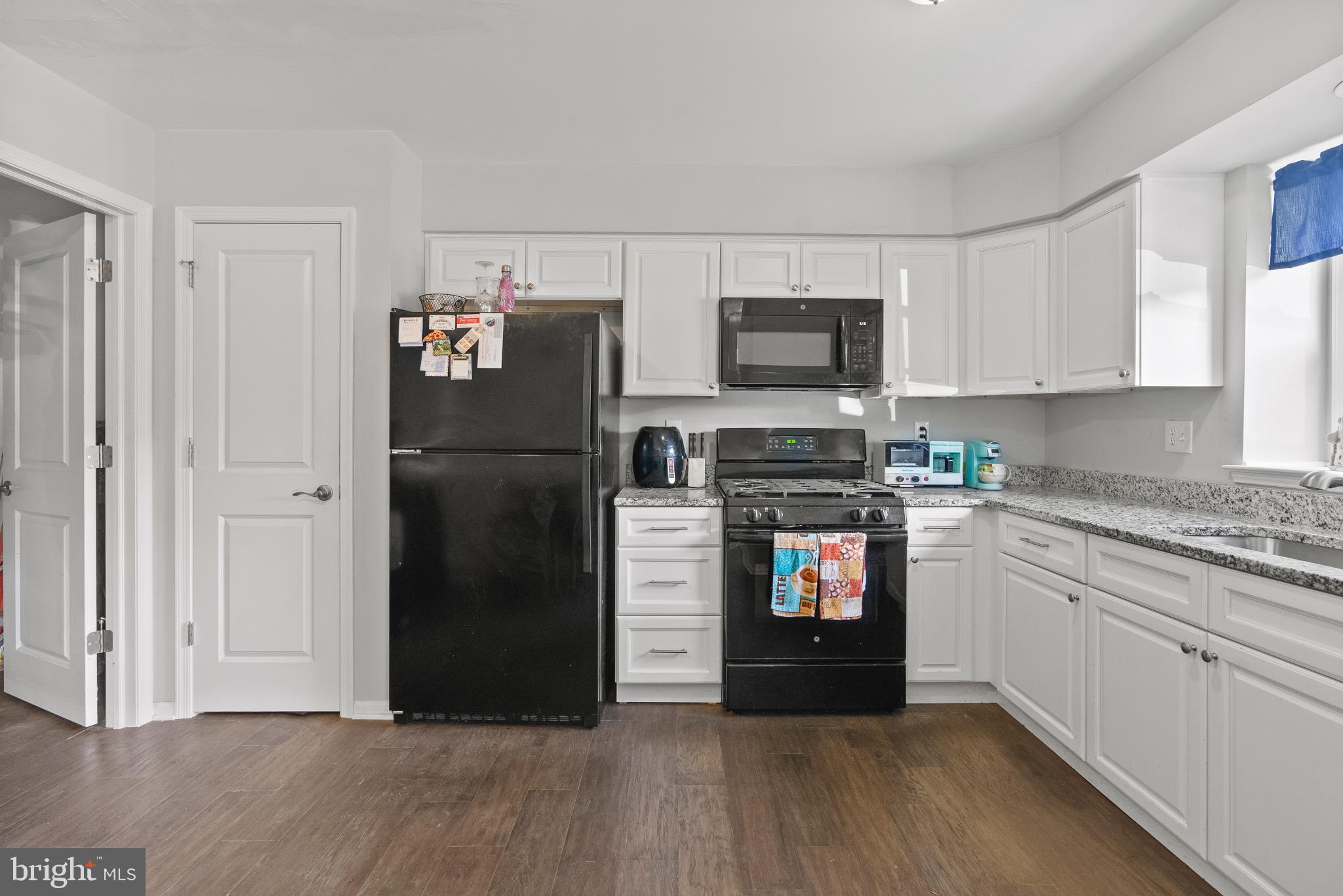 2297 Memorial Court Atco, NJ 08004 - Photo 7 of 21 a kitchen with stainless steel appliances granite countertop a refrigerator stove and sink