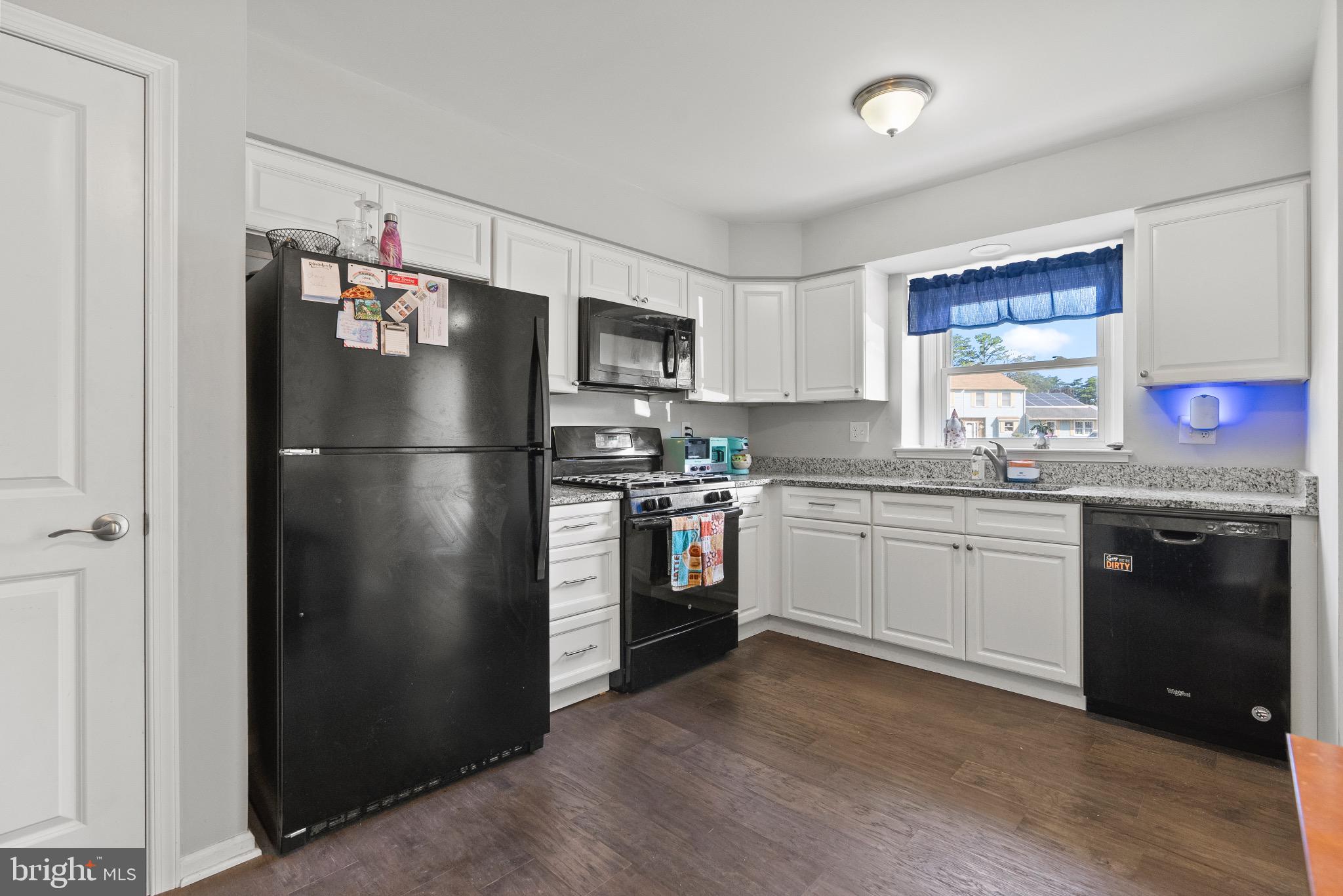 2297 Memorial Court Atco, NJ 08004 - Photo 8 of 21 a kitchen with stainless steel appliances granite countertop a refrigerator and a stove top oven