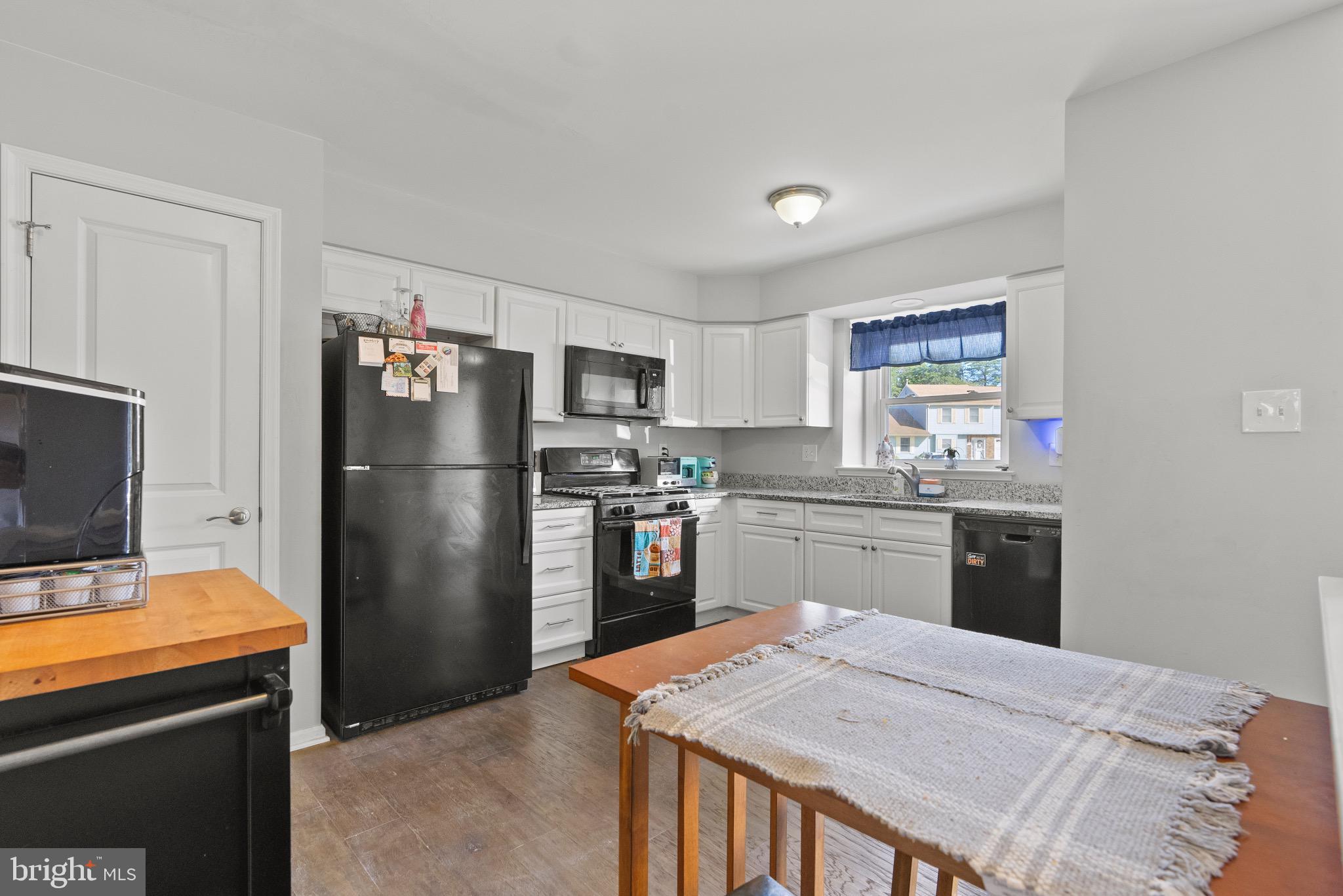2297 Memorial Court Atco, NJ 08004 - Photo 9 of 21 a kitchen with stainless steel appliances granite countertop a refrigerator stove microwave and sink