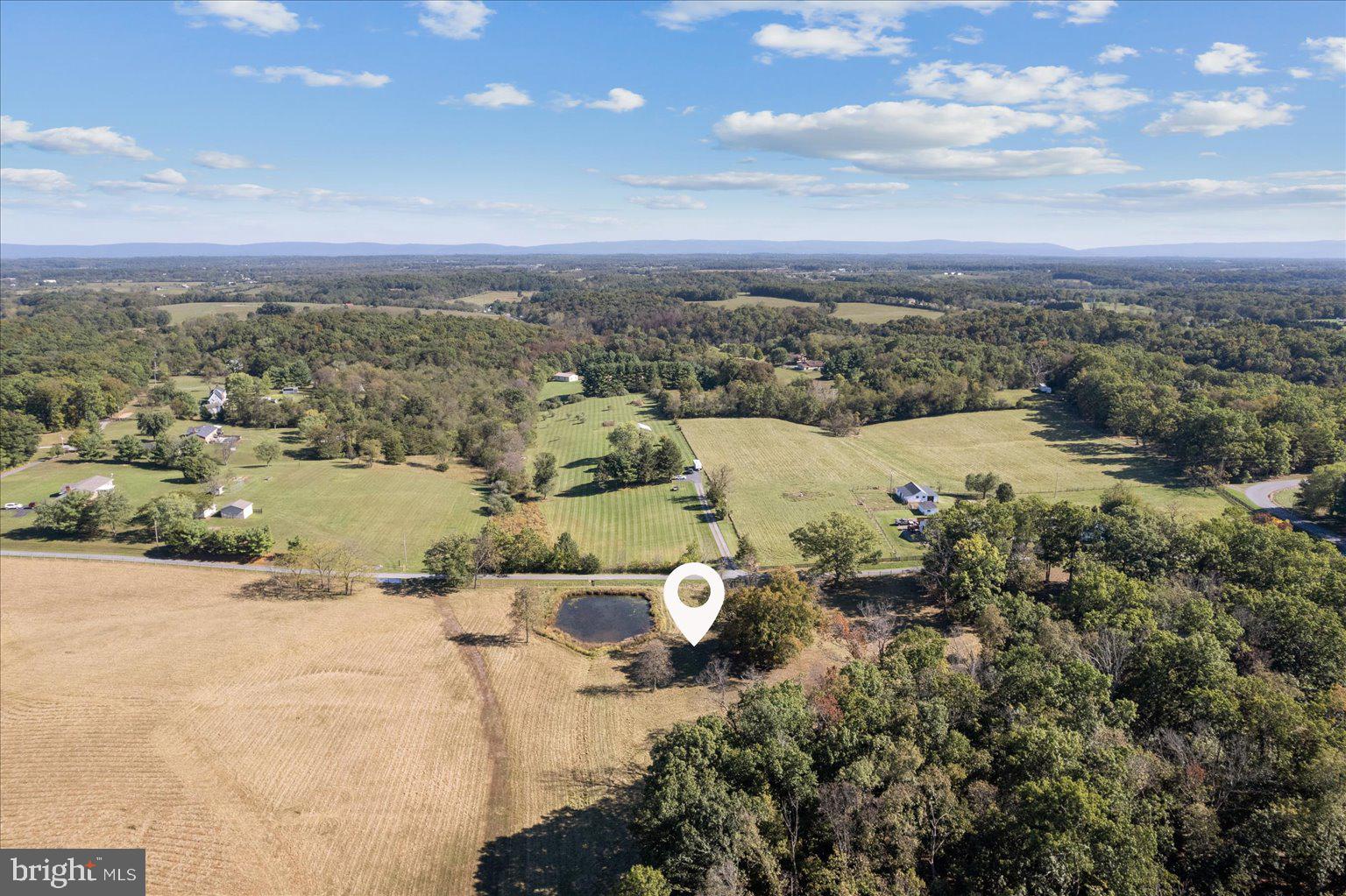 9 B Slate Lane Stephenson, VA 22656 - Photo 14 of 14 an aerial view of a house with a lake view