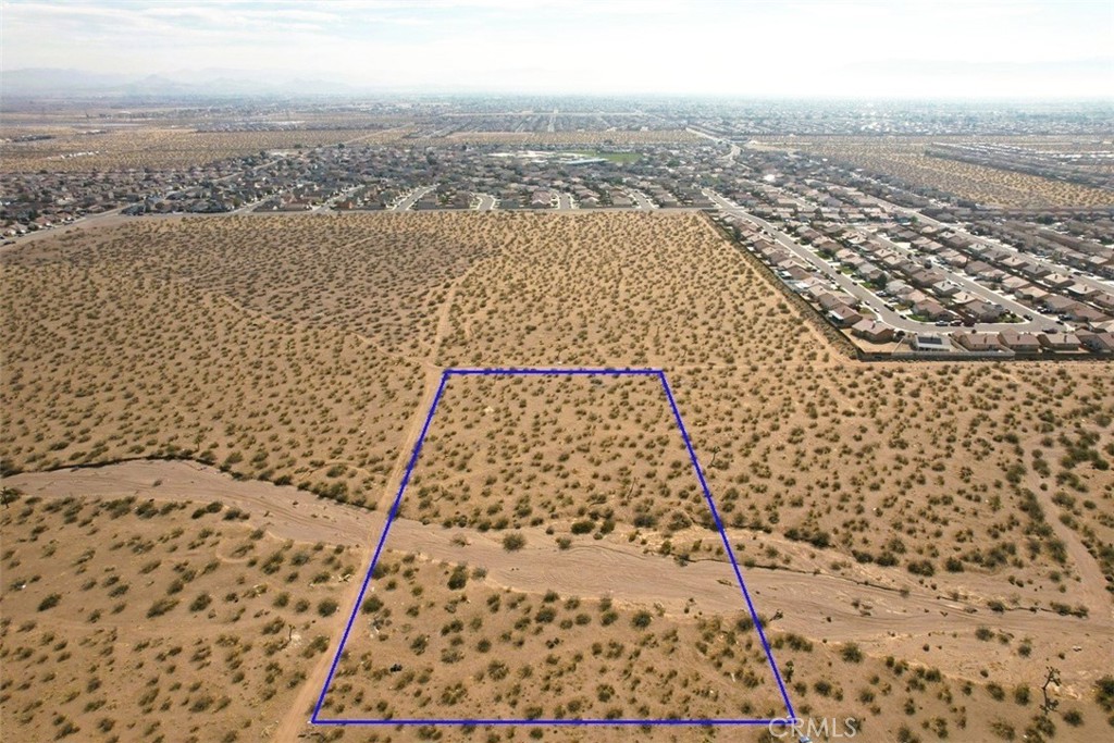 8 Maricopa Road Victorville, CA 92392 - Photo 1 of 14 an aerial view of residential houses with outdoor space
