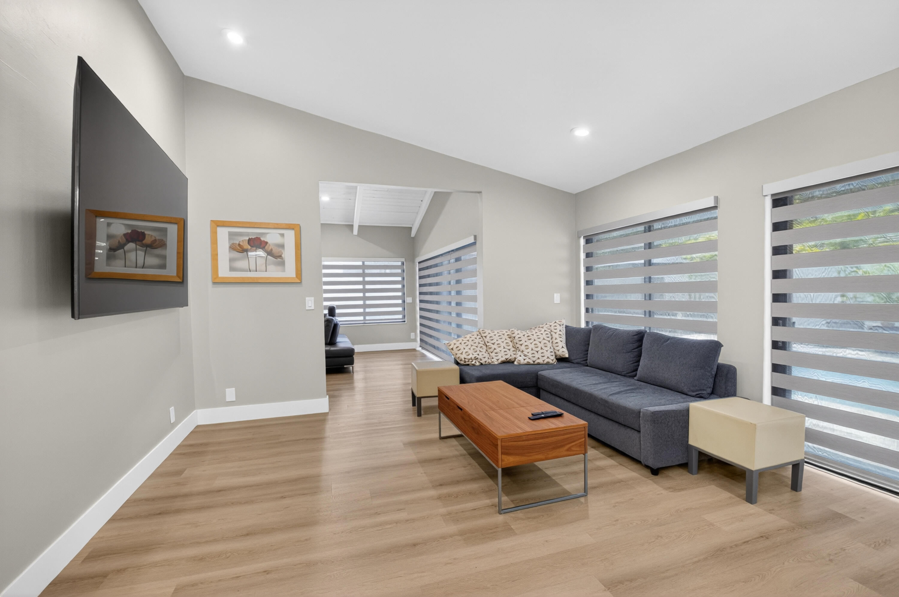 7374 Woodmont Court Boca Raton, FL 33434 - Photo 12 of 95 a living room with furniture and a wooden floor