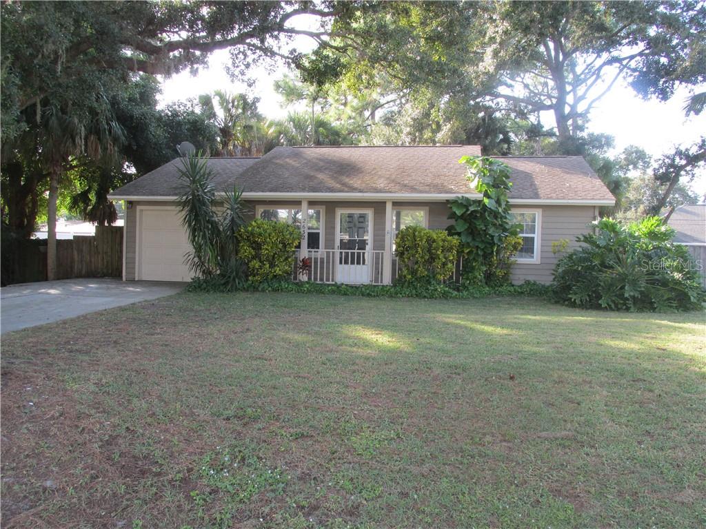 2632 Osage Road Venice, FL 34293 - Photo 1 of 1 a view of a house with a yard and potted plants