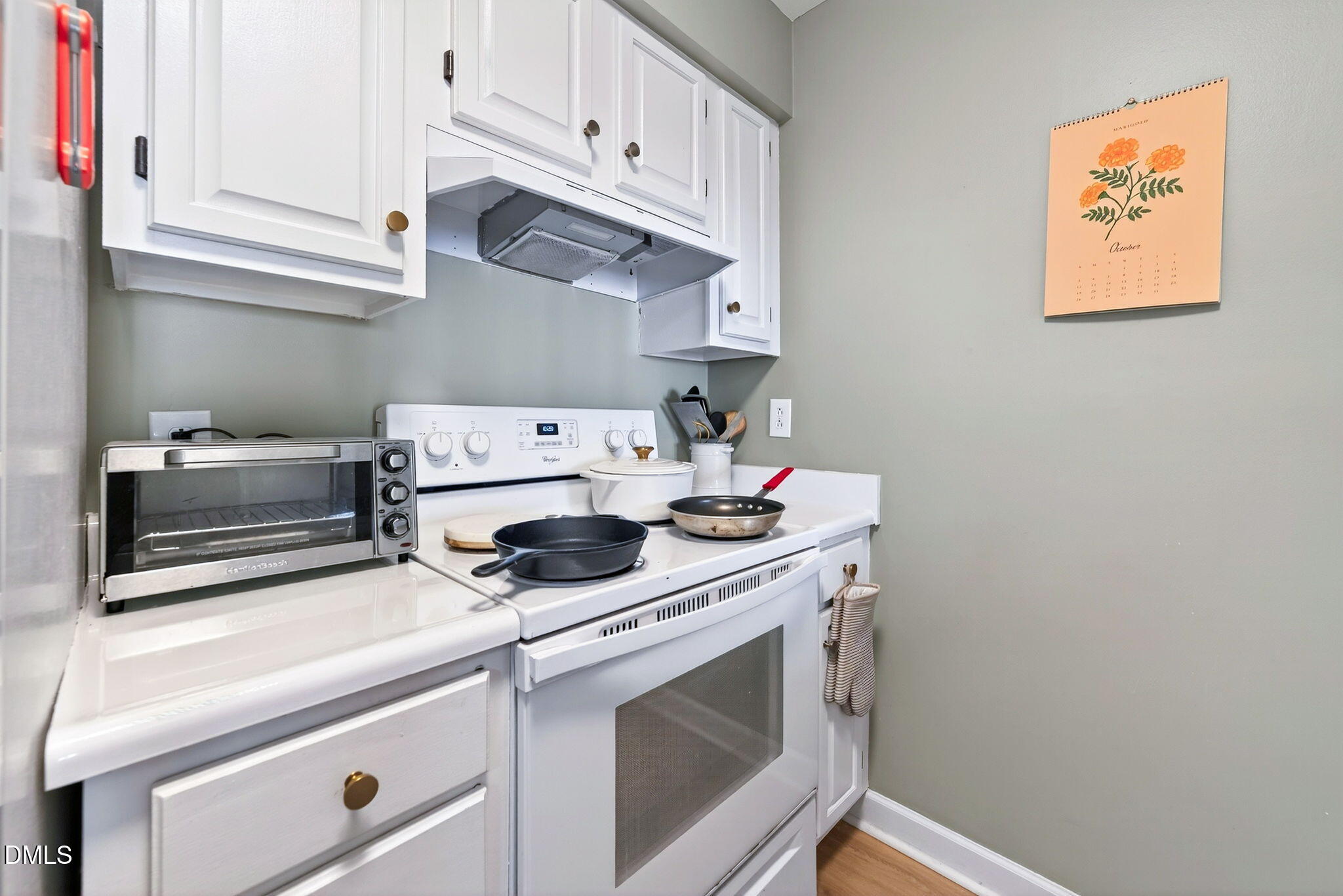 3307 Tarleton West Durham, NC 27713 - Photo 14 of 39 The kitchen features white cabinets and countertops.
